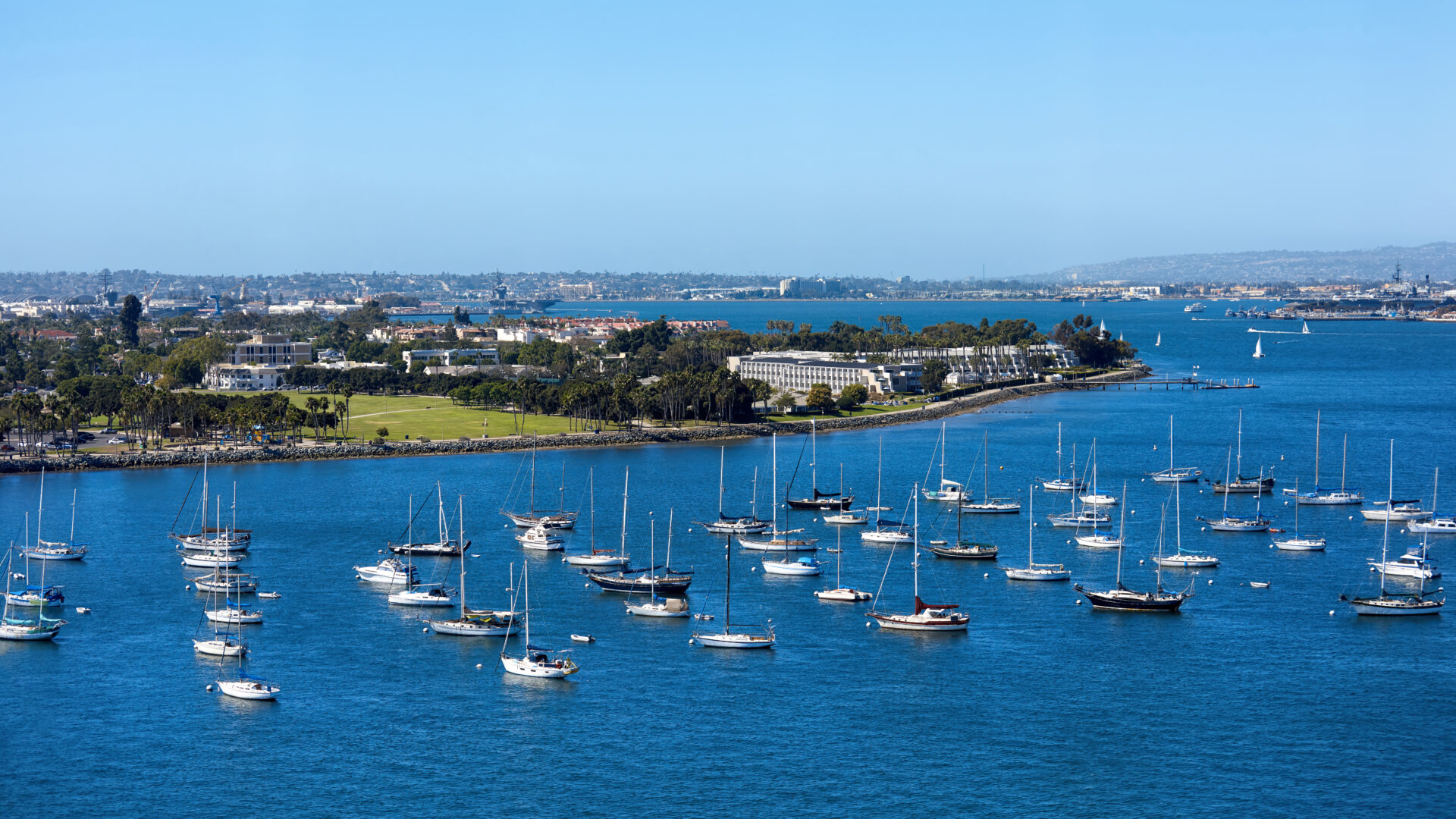 Sailing boats in waterfront area. Cityscape on background. San Diego, California